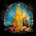 nos-bieres-biere-malaka-orange-aromatisee-guarana-ginseng-gingembre-noix-kola-sorcellerie-bouteille-magie-allume-2-1280x1219
